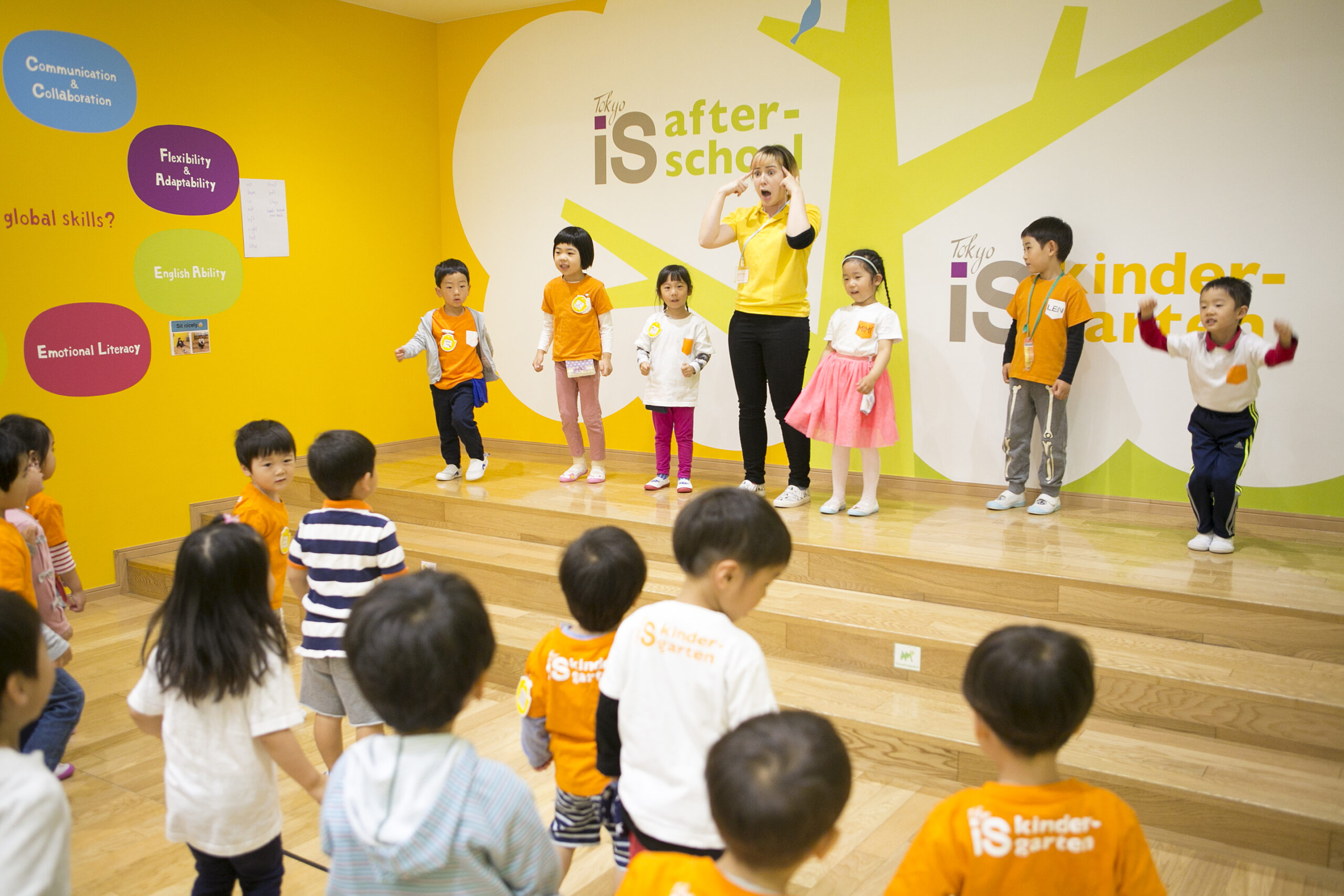 TISG Teacher and students dancing on stage