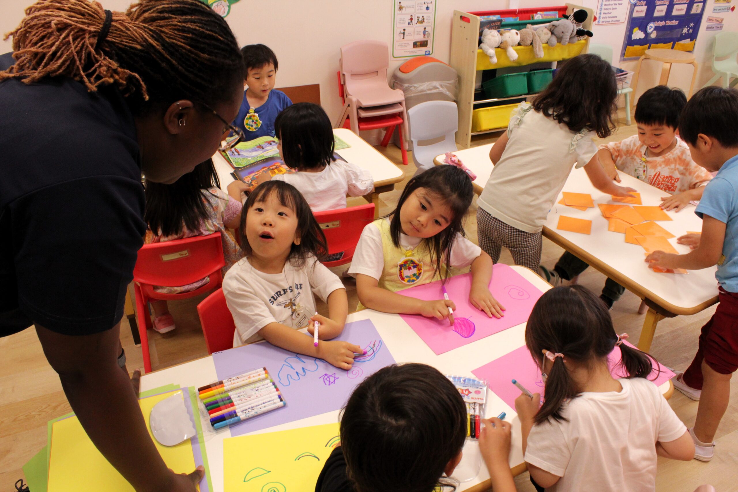 TISG students drawing pictures during their class
